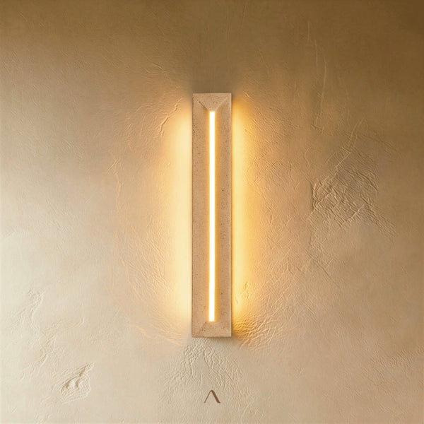 Bedoin Wall Lamp — a slim travertine wall lamp with an integrated LED