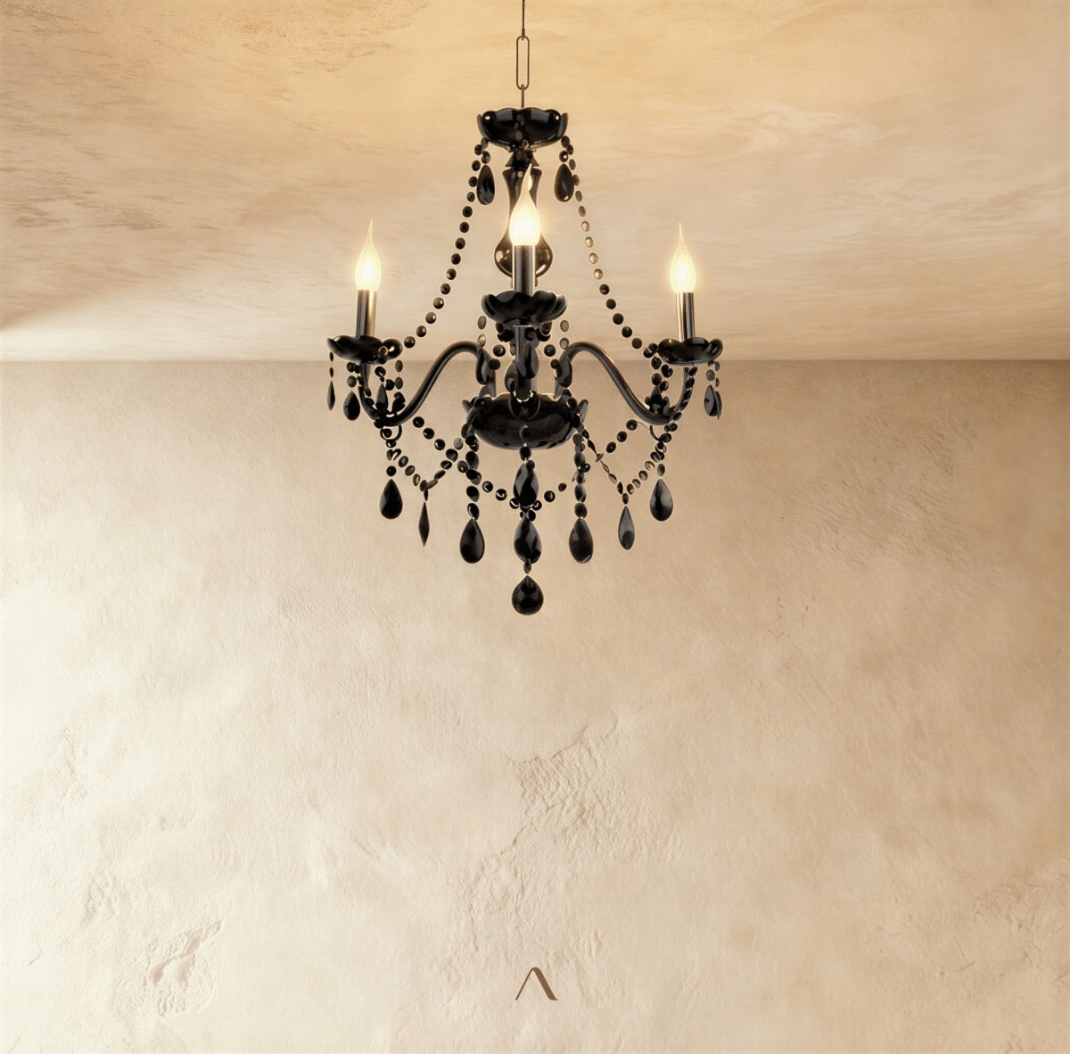 Black crystal and forged-metal chandelier with curved arms hanging above a wood dining table
