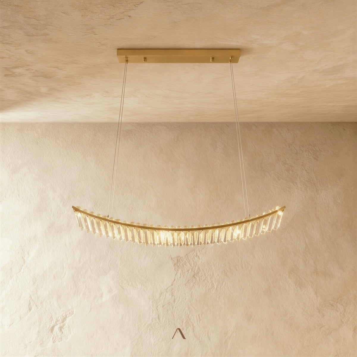 Cut crystal diamonds set in a wrought-iron chandelier frame, casting a pattern of light and shadow across a wall