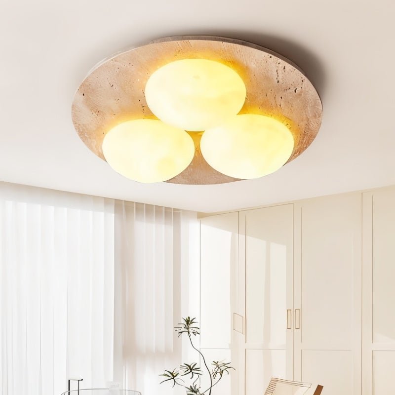 image_text: Twila-Ceiling-Lamp-Closeup-Travertine-Base-Glow...