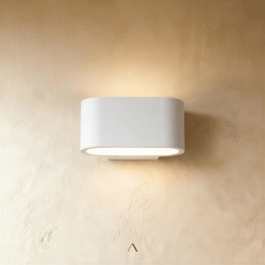 Enontekio Wall Lamp — a smooth gypsum wall lamp that sends light gently upward and downward