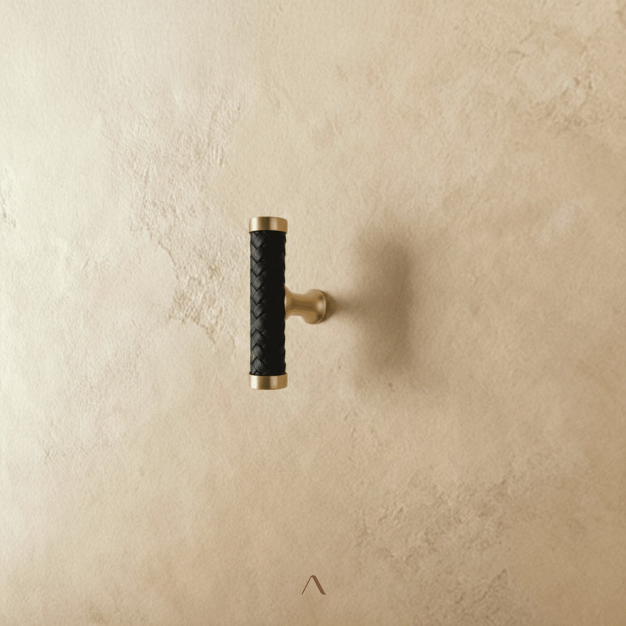 Streymoy Knob — a cylindrical cabinet pull in braided leather and zinc alloy